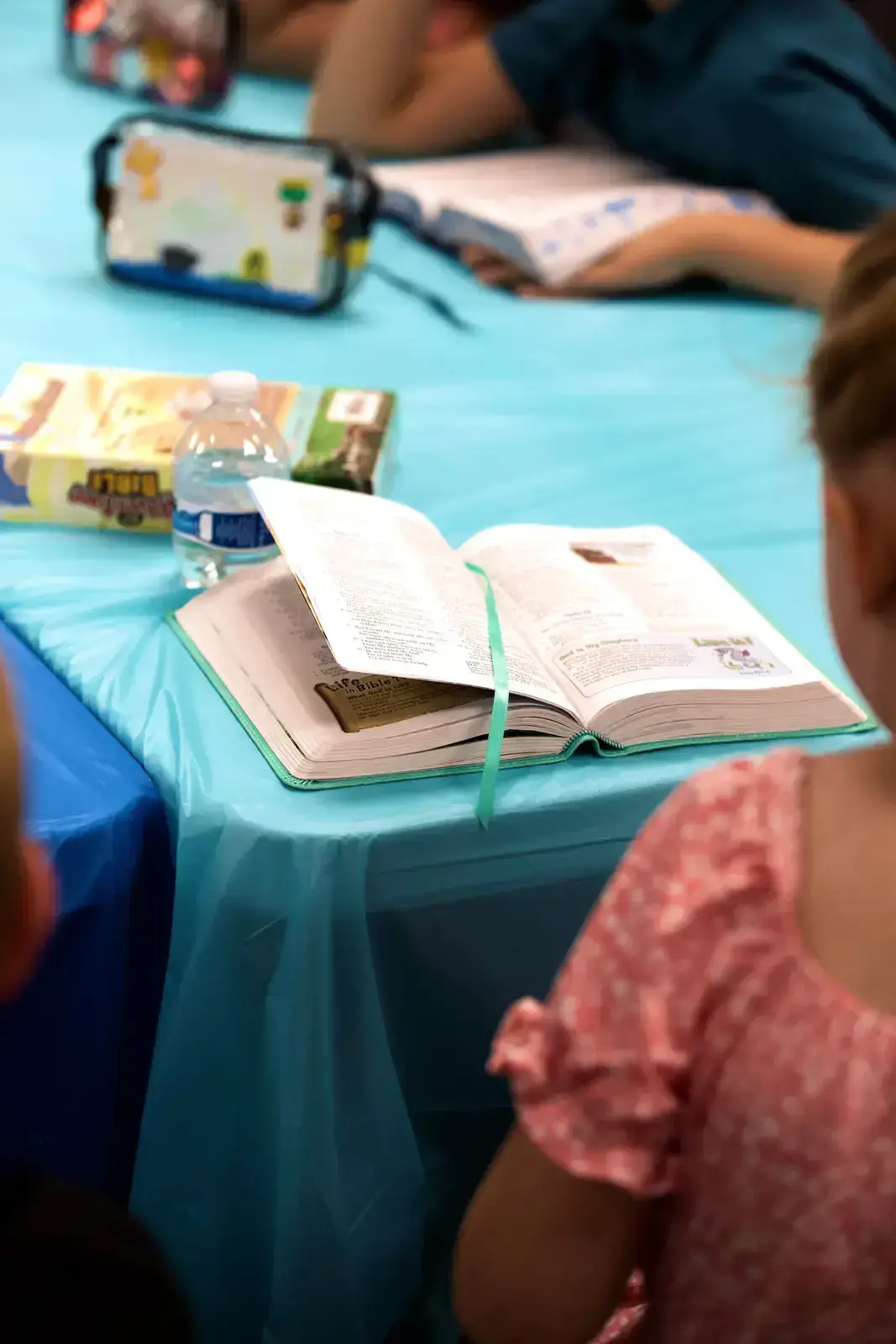 An open children’s Bible during a Pillar Kids lesson
